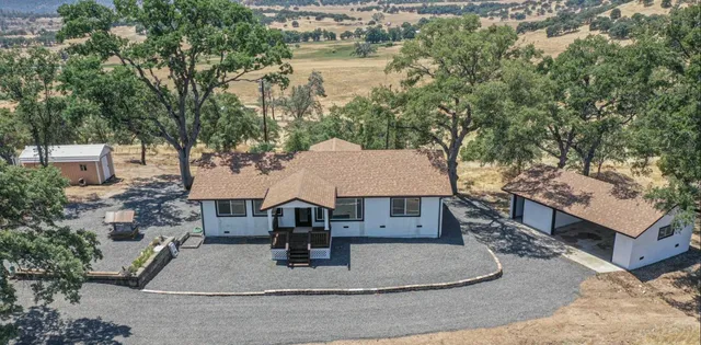 a building with trees in the background