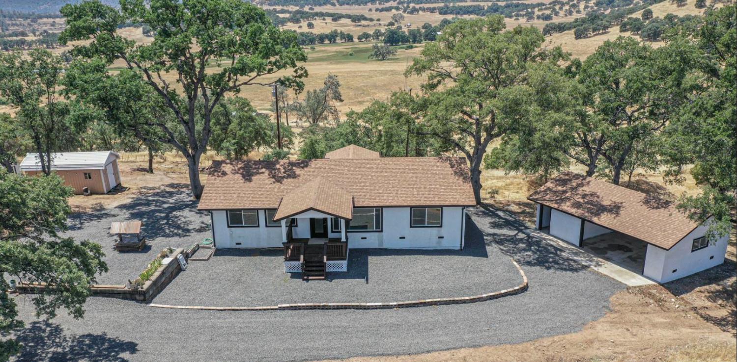 14594 Perricone Road Jamestown, CA 95327 - Photo 3 of 48 a building with trees in the background