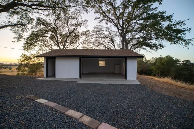 a view of a room with a large window