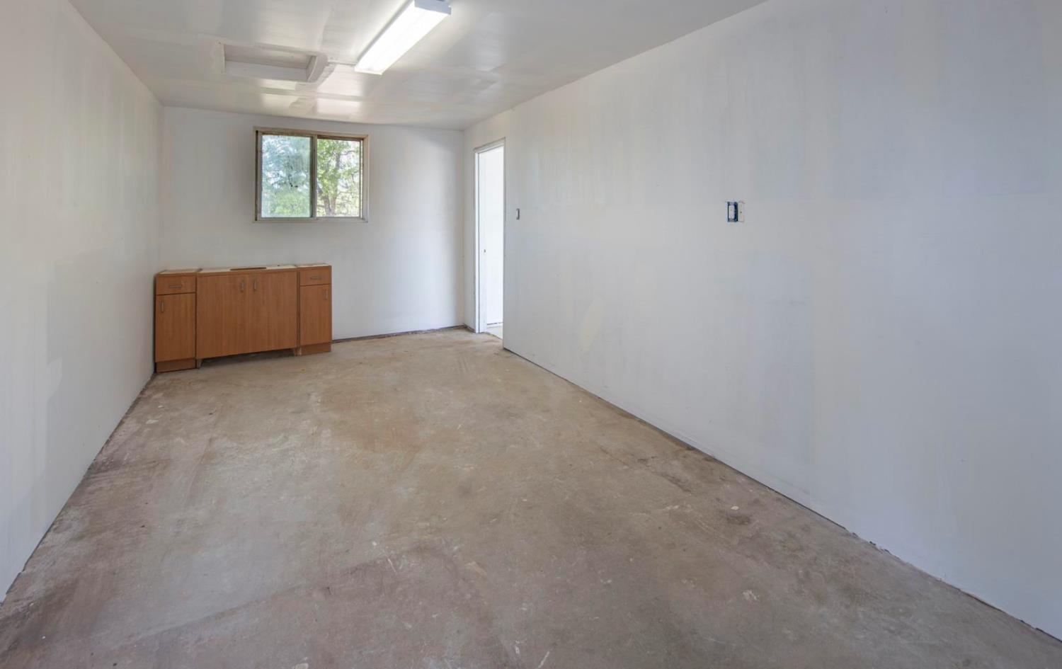 14594 Perricone Road Jamestown, CA 95327 - Photo 38 of 48 a view of an empty room with a window