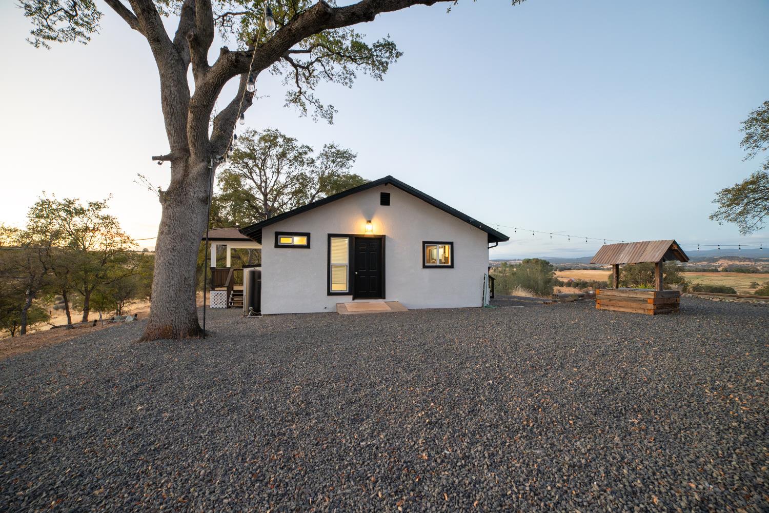 14594 Perricone Road Jamestown, CA 95327 - Photo 40 of 48 a view of a house with a yard and large tree