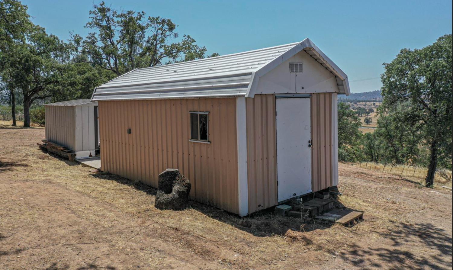 14594 Perricone Road Jamestown, CA 95327 - Photo 42 of 48 a view of a small house with yard