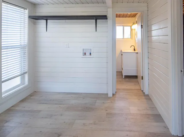 a view of a kitchen with a sink