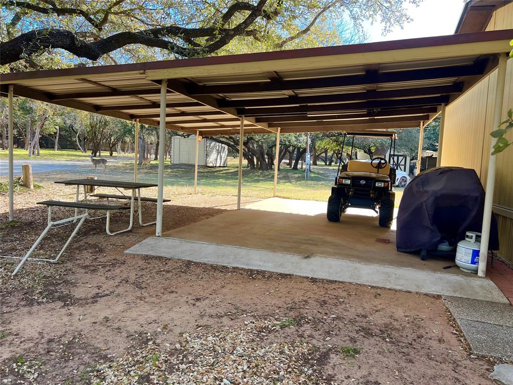 1935 Deer Trail Road Graford, TX 76449 - Photo 21 of 36 Carport parking, and great space to BBQ and Entertain
