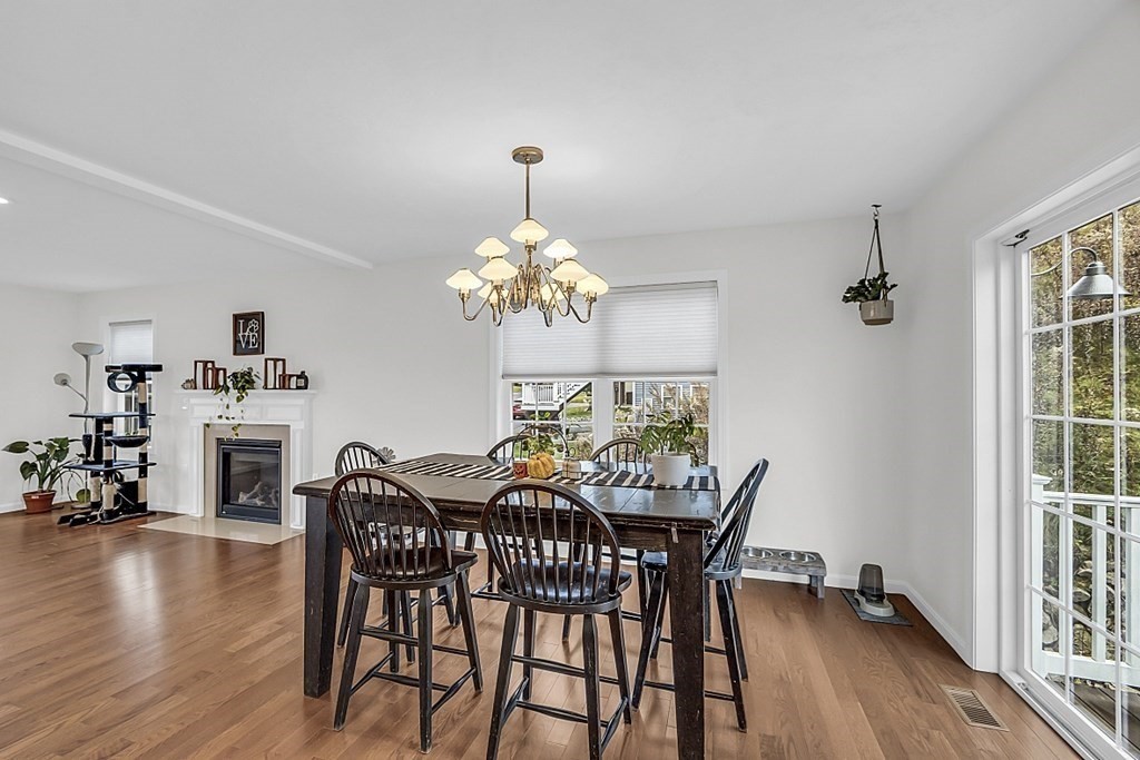 22 Paper Birch Path, Unit 36 Worcester, MA 01605 - Photo 11 of 34 a view of a dining room with furniture and wooden floor