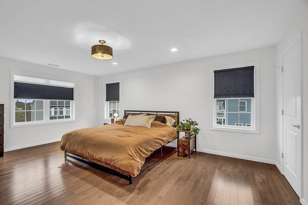 22 Paper Birch Path, Unit 36 Worcester, MA 01605 - Photo 19 of 34 a bedroom with a bed and a window