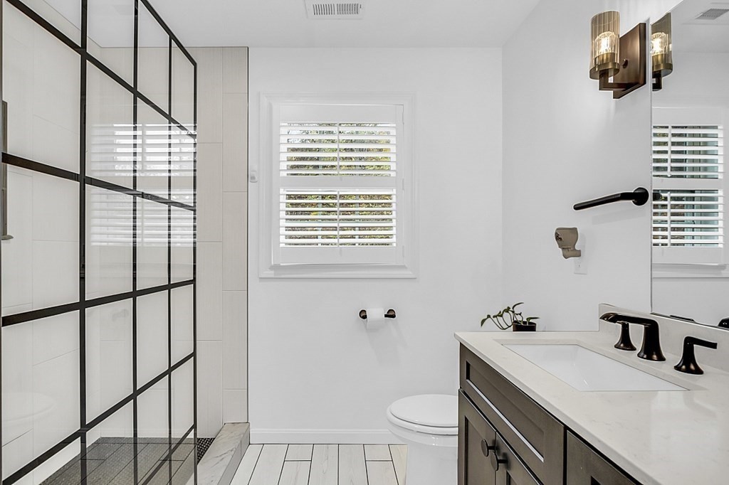 22 Paper Birch Path, Unit 36 Worcester, MA 01605 - Photo 23 of 34 a bathroom with a sink a toilet and shower