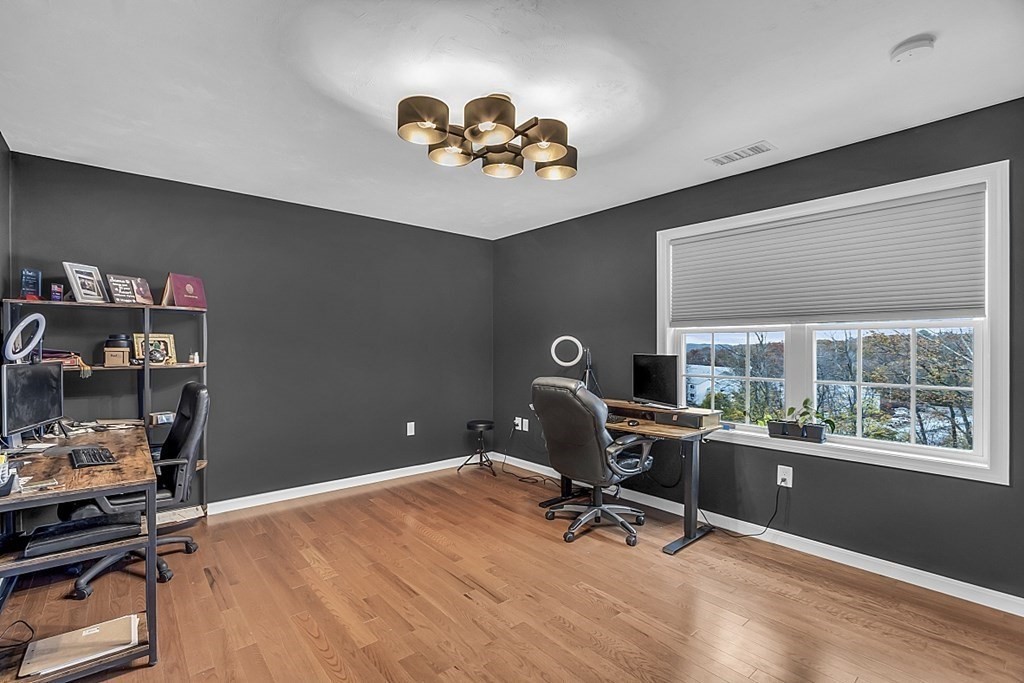 22 Paper Birch Path, Unit 36 Worcester, MA 01605 - Photo 25 of 34 a view of a workspace with furniture and a window