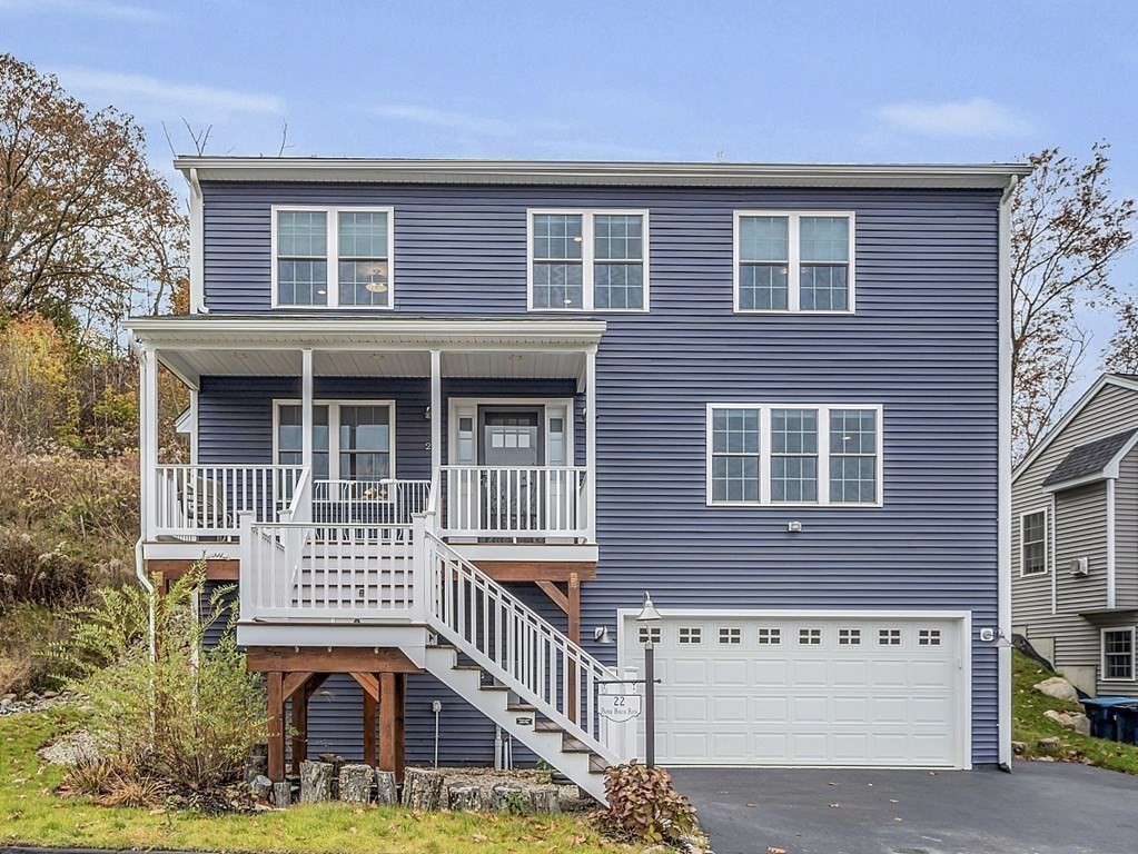 22 Paper Birch Path, Unit 36 Worcester, MA 01605 - Photo 33 of 34 a front view of a house with a yard