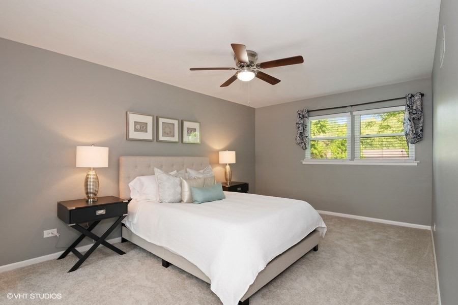 1218 Delles Road Wheaton, IL 60189 - Photo 6 of 6 a bedroom with a bed and a window