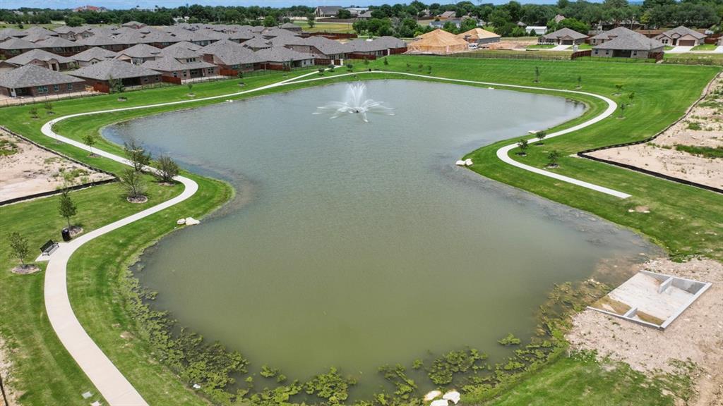1905 Cherokee Lane Cleburne, TX 76033 - Photo 35 of 39 an aerial view of a swimming pool with a yard