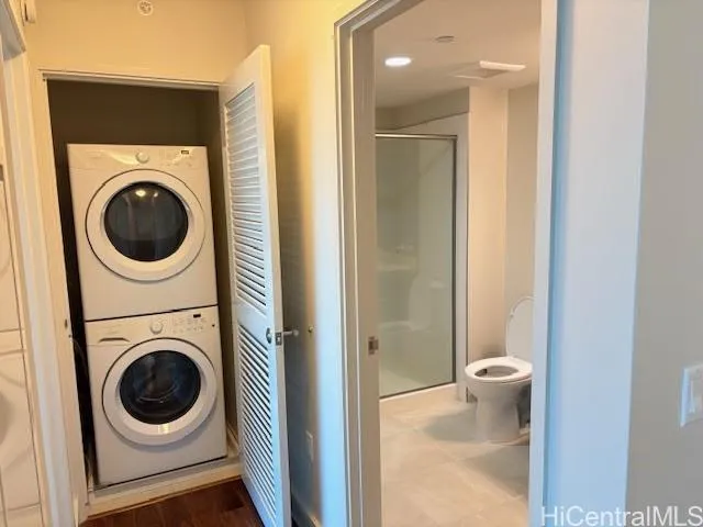 a view of a bathroom with a washer and dryer