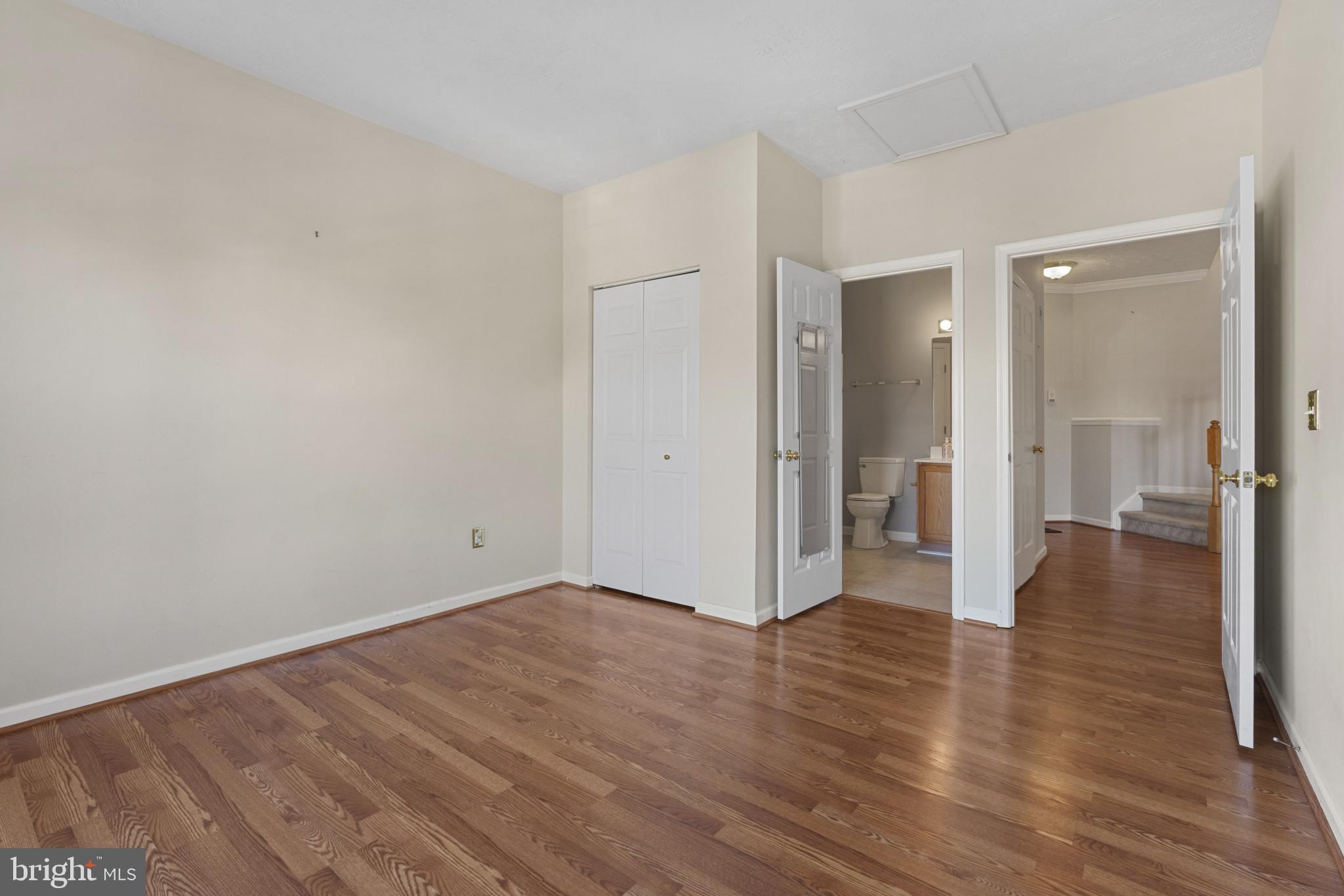 4868 Brightleaf Court, Unit 4868 Rosedale, MD 21237 - Photo 13 of 25 a view of a hallway with wooden floor