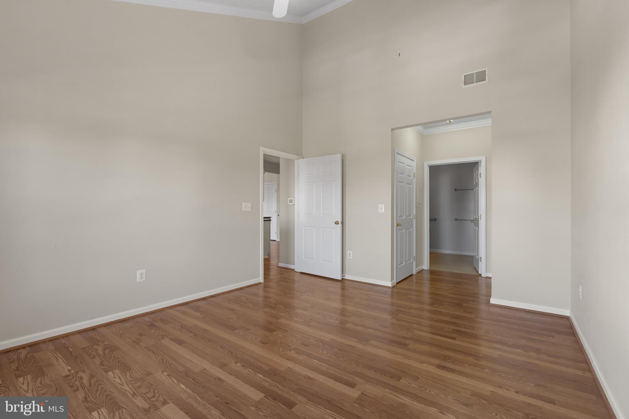4868 Brightleaf Court, Unit 4868 Rosedale, MD 21237 - Photo 20 of 25 a view of an empty room and wooden floor
