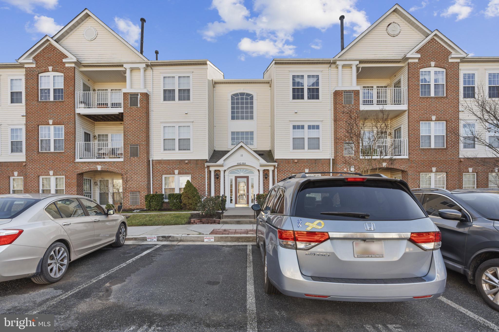 4868 Brightleaf Court, Unit 4868 Rosedale, MD 21237 - Photo 25 of 25 a front view of a house with parking space