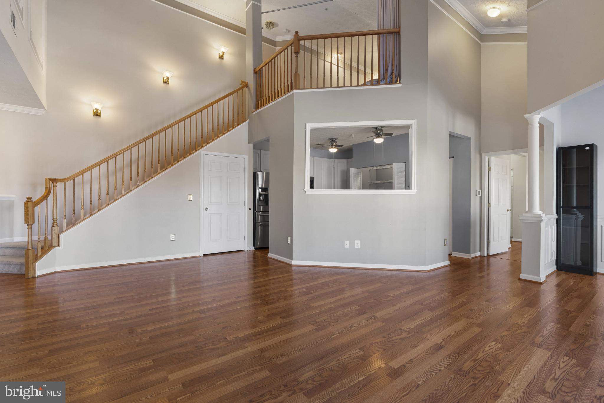 4868 Brightleaf Court, Unit 4868 Rosedale, MD 21237 - Photo 3 of 25 a view of an entryway with wooden floor