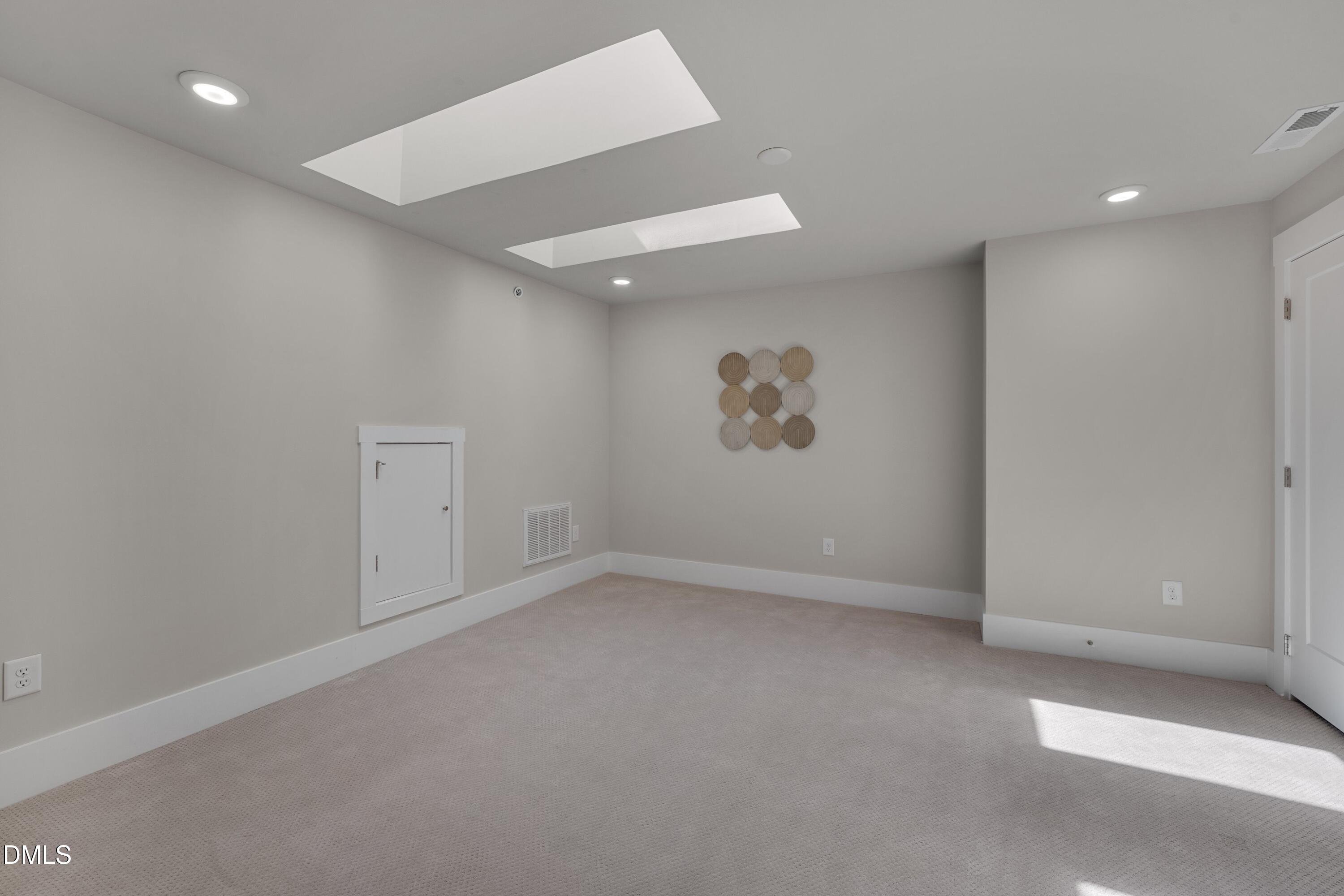 10330 Sablewood Drive, Unit 104 Raleigh, NC 27617 - Photo 16 of 28 an empty room with windows