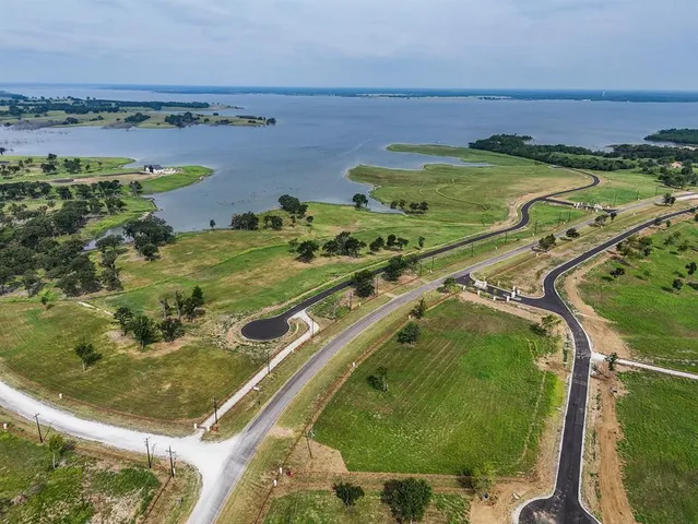 a view of a swimming pool and an outdoor seating