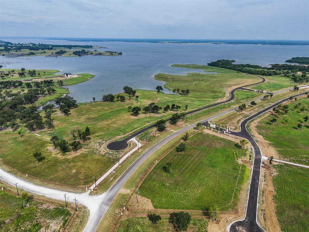 259 Lakeshore Terrace Windom, TX 75492 - Photo 25 of 35 a view of a swimming pool and an outdoor seating
