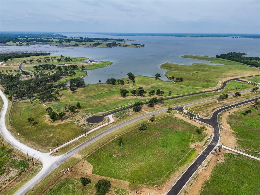 259 Lakeshore Terrace Windom, TX 75492 - Photo 26 of 35 a view of a swimming pool and an outdoor seating
