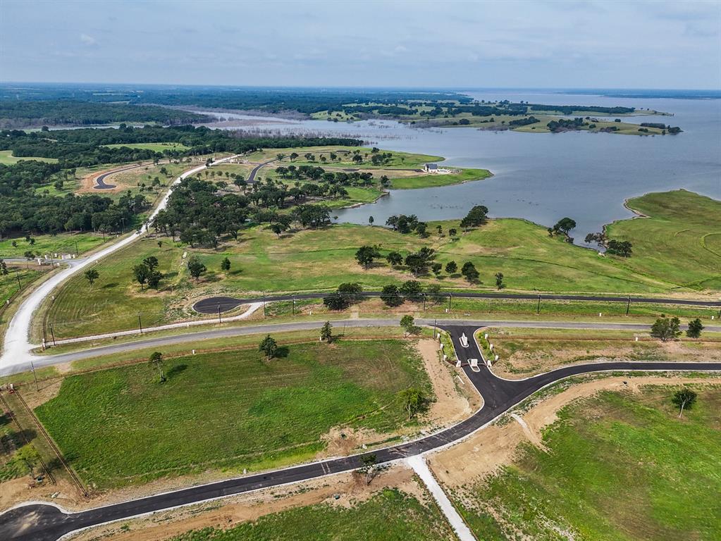 259 Lakeshore Terrace Windom, TX 75492 - Photo 28 of 35 a view of a swimming pool and an outdoor seating