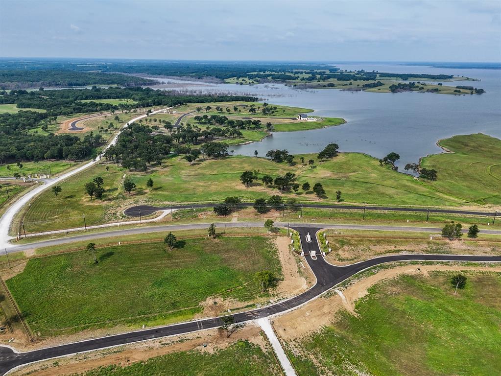 259 Lakeshore Terrace Windom, TX 75492 - Photo 29 of 35 a view of a lake with a big yard