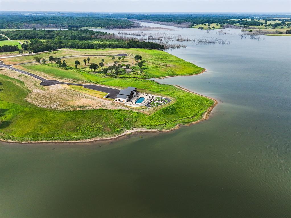 259 Lakeshore Terrace Windom, TX 75492 - Photo 30 of 35 an aerial view of a house a yard and lake view