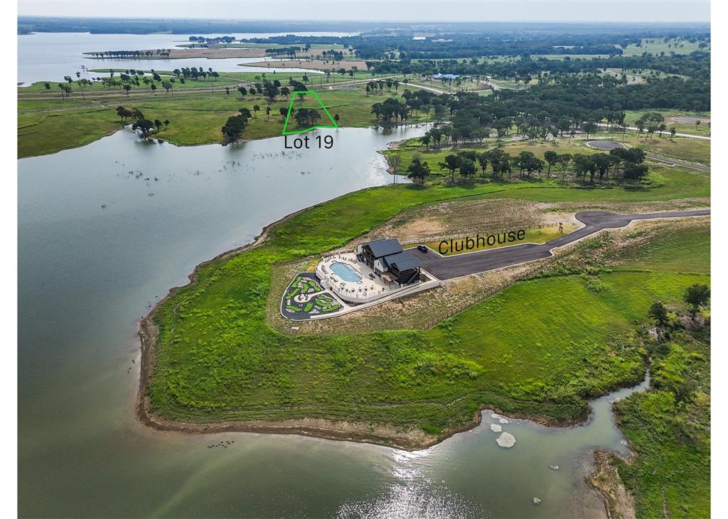 259 Lakeshore Terrace Windom, TX 75492 - Photo 35 of 35 an aerial view of a house with a yard