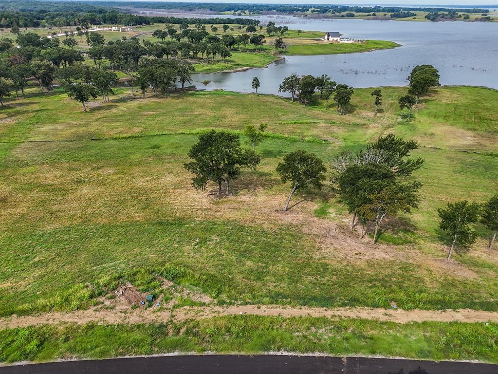 259 Lakeshore Terrace Windom, TX 75492 - Photo 5 of 35 a view of a yard with an outdoor space