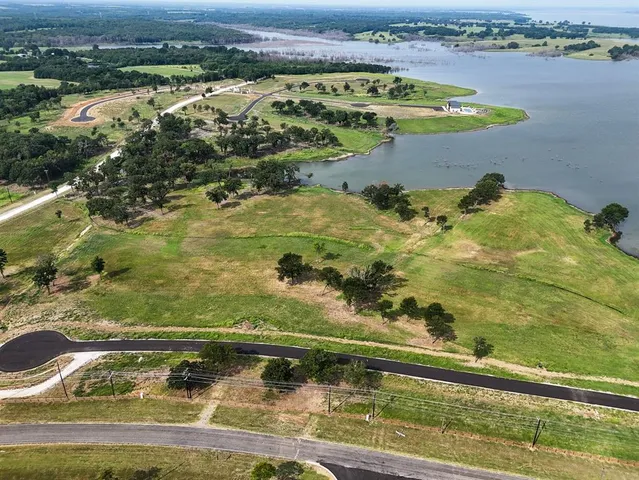 a view of a lake with a city