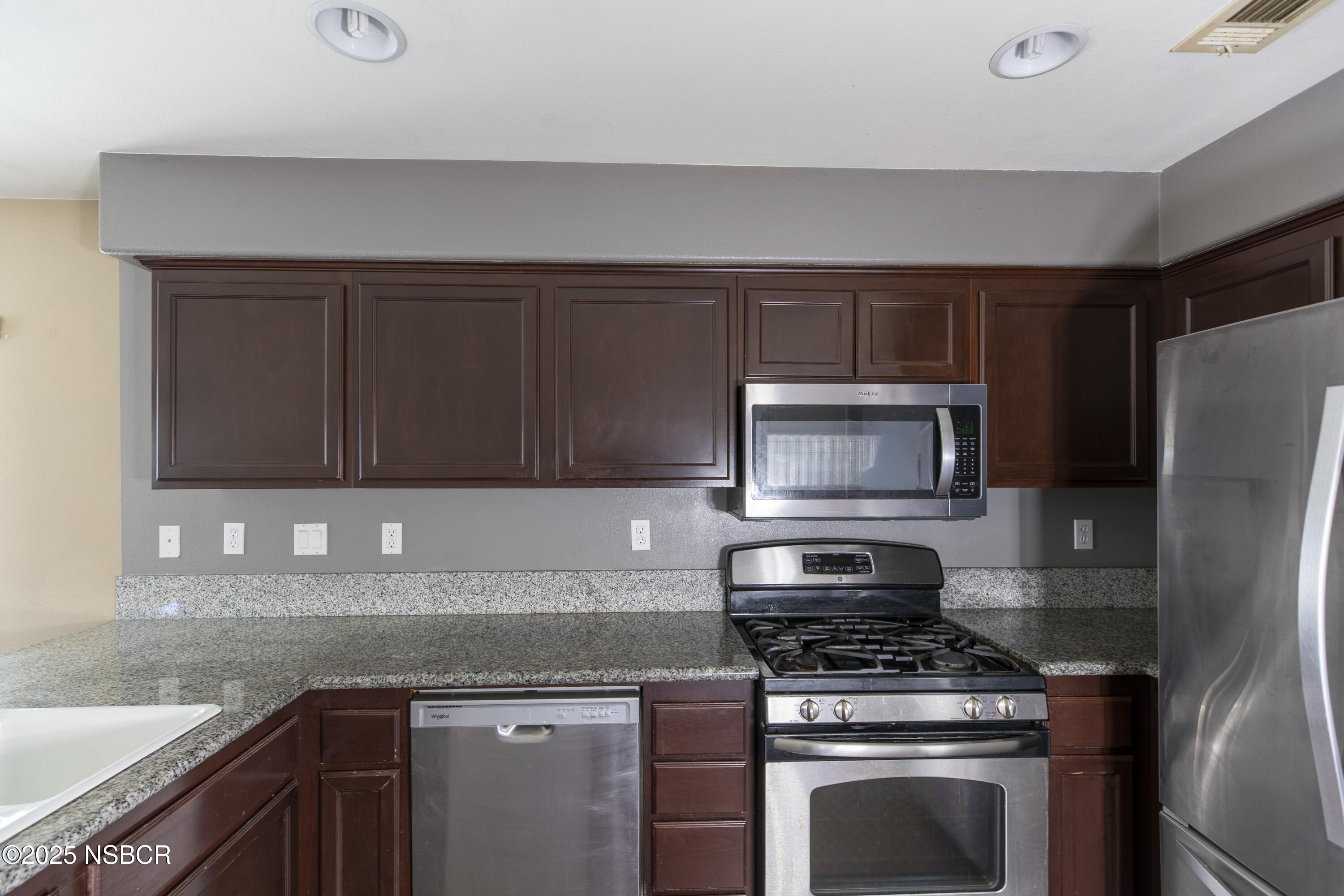 1355 Crown Circle Lompoc, CA 93436 - Photo 6 of 44 a kitchen with a stove microwave and refrigerator