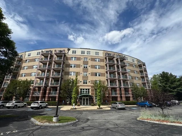 a front view of a building with street view