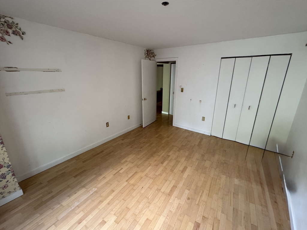 273 Cambridge Road, Unit 202 Woburn, MA 01801 - Photo 30 of 38 a view of empty room