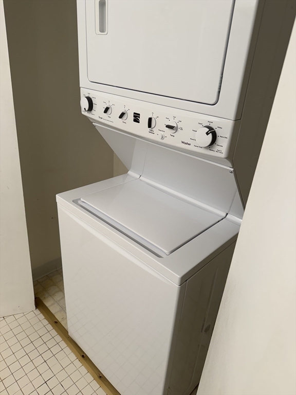 273 Cambridge Road, Unit 202 Woburn, MA 01801 - Photo 32 of 38 a close up view of washer and dryer