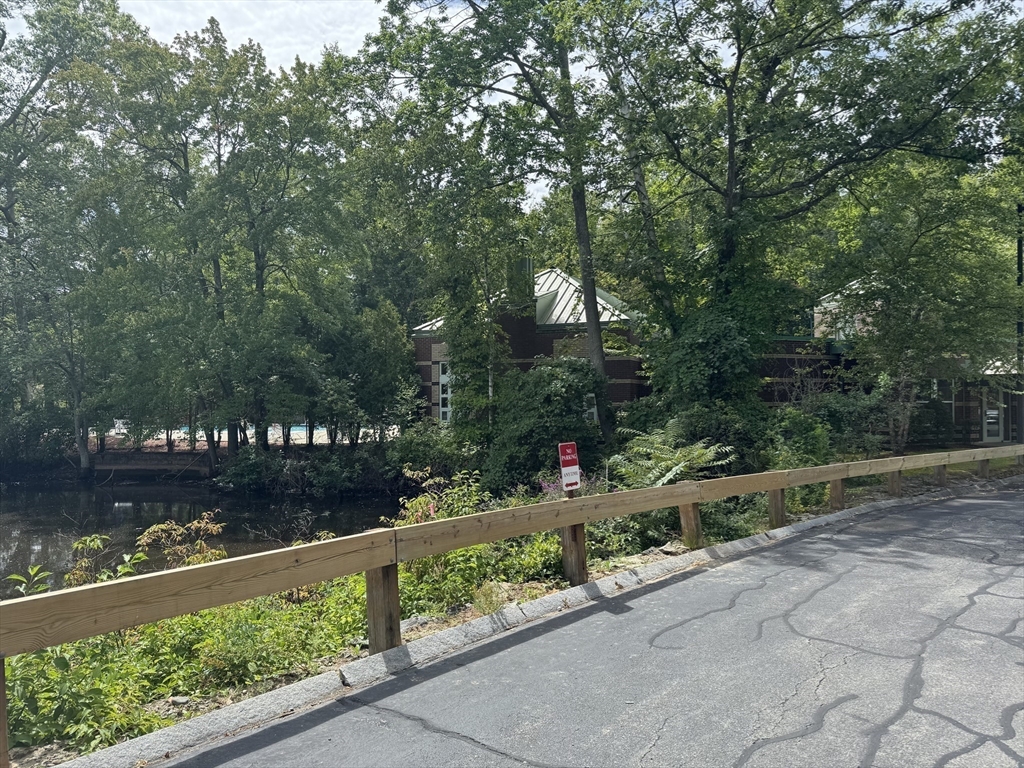 273 Cambridge Road, Unit 202 Woburn, MA 01801 - Photo 35 of 38 a view of a wooden bridge