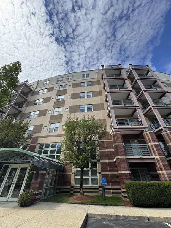 273 Cambridge Road, Unit 202 Woburn, MA 01801 - Photo 4 of 38 a front view of a building