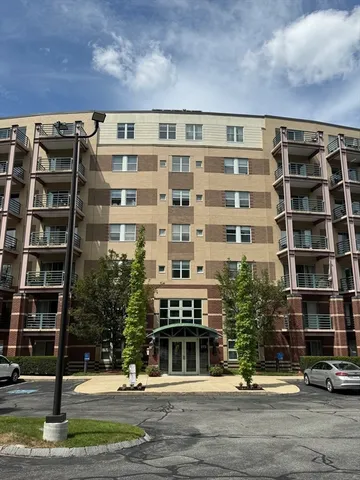 a front view of a building with street view