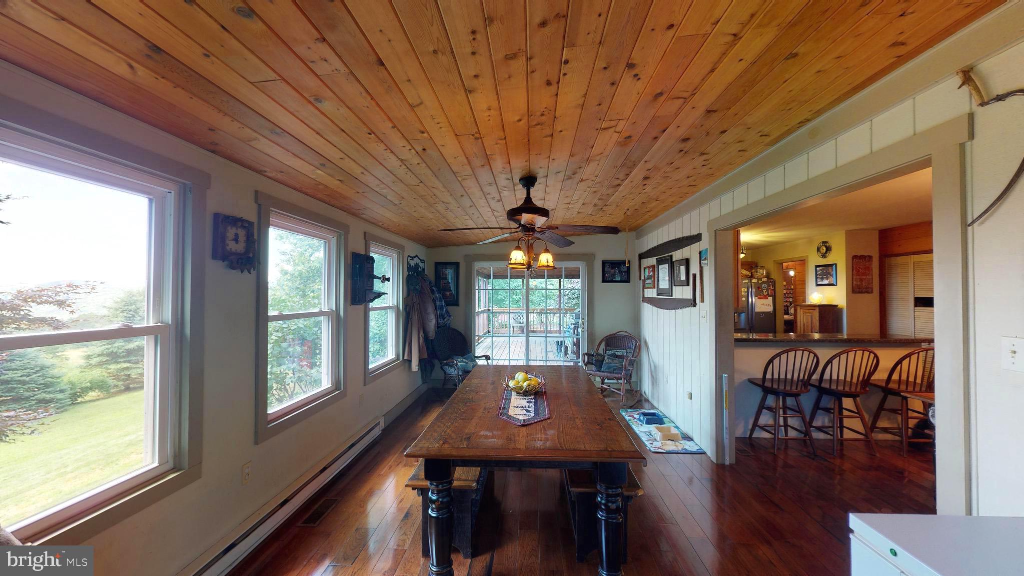 4038 Mount Olive Road Rio, WV 26755 - Photo 7 of 80 Sunroom overlooks the surrounding mountains