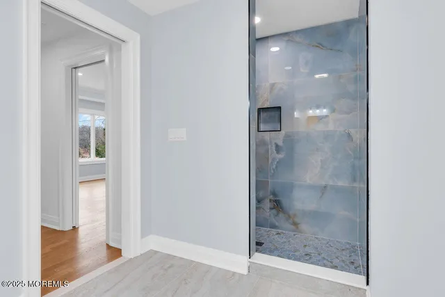 a bathroom with a sink toilet a shower and bathtub