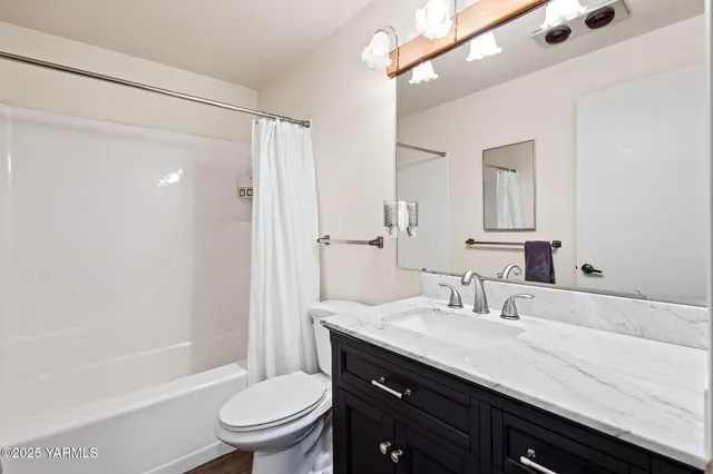 a building outdoor space with patio furniture and potted plants