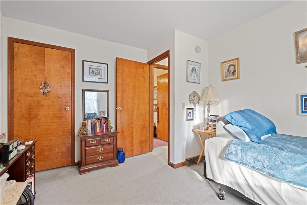 2997 Spangler Road Hermitage, PA 16148 - Photo 20 of 43 a living room with furniture a bed and a window