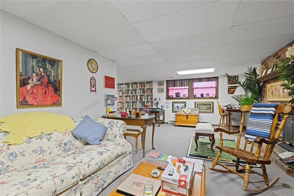 2997 Spangler Road Hermitage, PA 16148 - Photo 23 of 43 a living room with furniture and flat screen tv