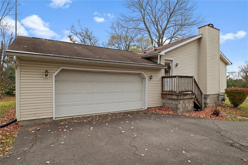 2997 Spangler Road Hermitage, PA 16148 - Photo 32 of 43 a view of a house with a garage