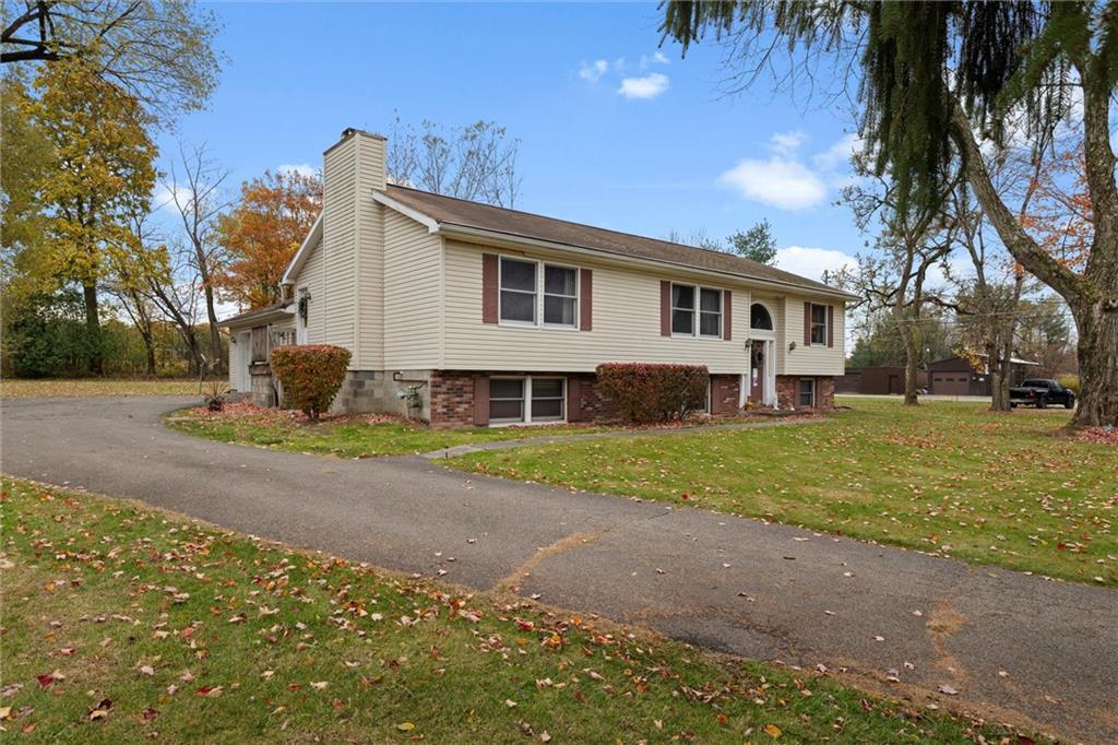 2997 Spangler Road Hermitage, PA 16148 - Photo 35 of 43 a view of a house with a yard and large trees