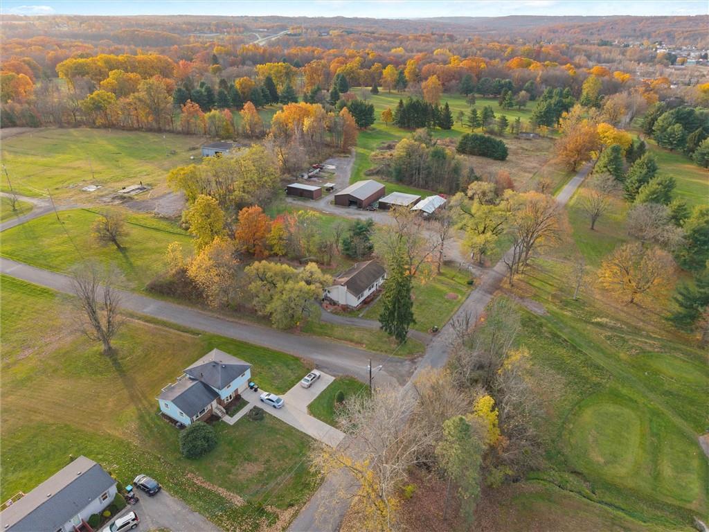 2997 Spangler Road Hermitage, PA 16148 - Photo 4 of 43 an aerial view of residential houses with outdoor space