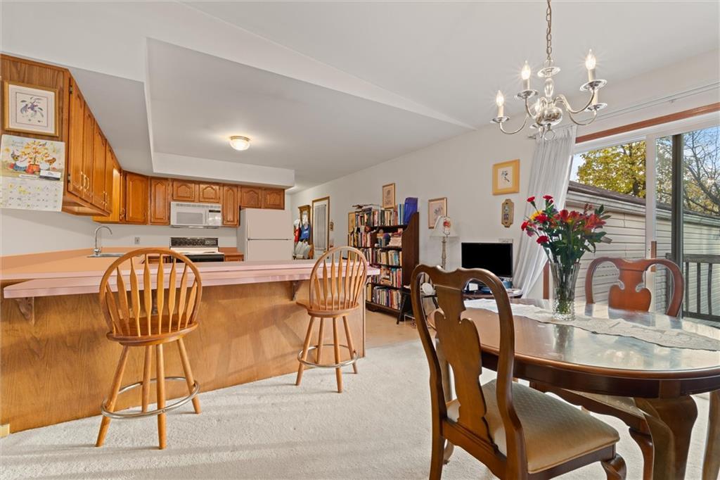 2997 Spangler Road Hermitage, PA 16148 - Photo 8 of 43 a dining room with furniture and chandelier