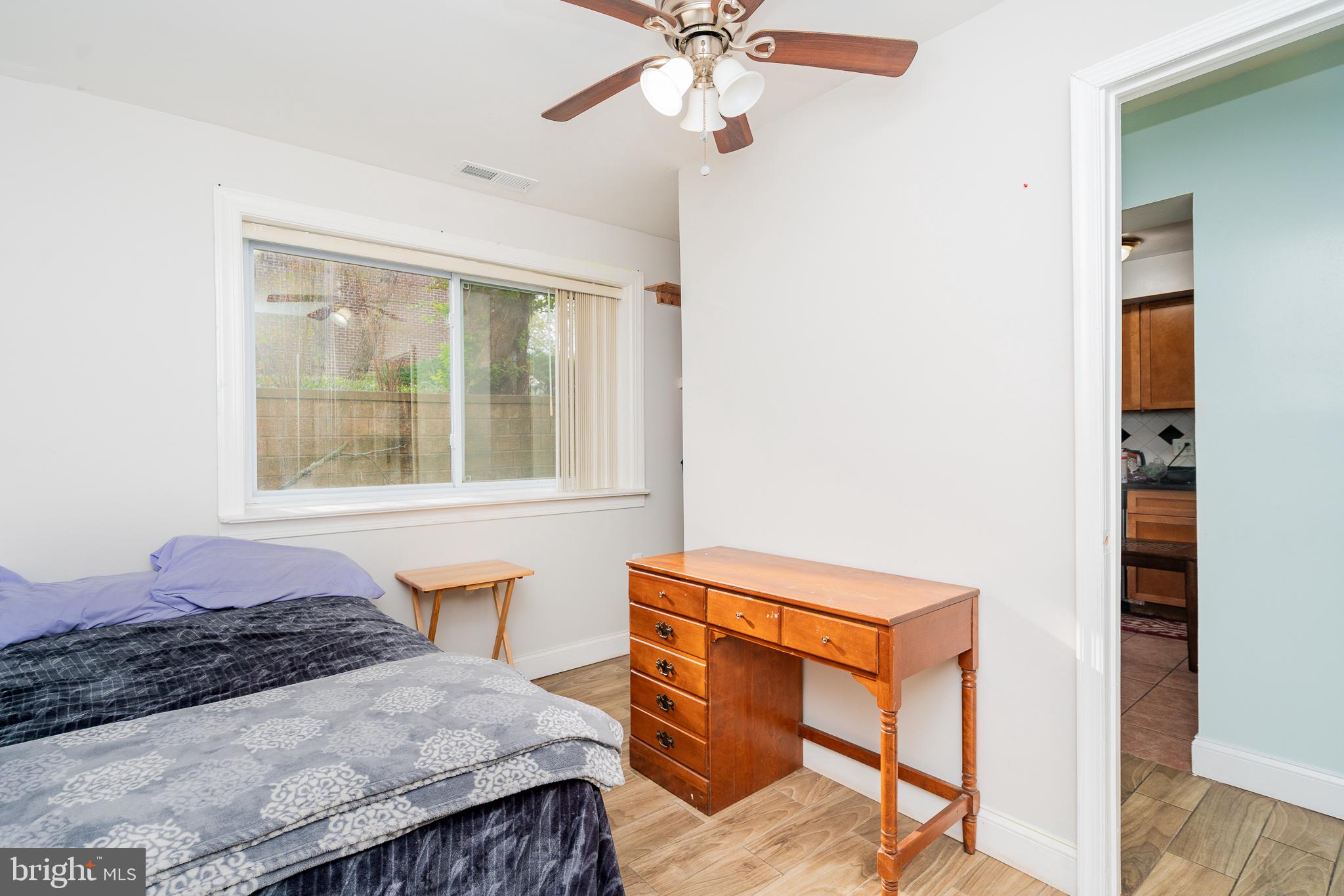 3960 Bel Pre Road, Unit 1 Silver Spring, MD 20906 - Photo 12 of 33 Cozy bedroom with natural light.