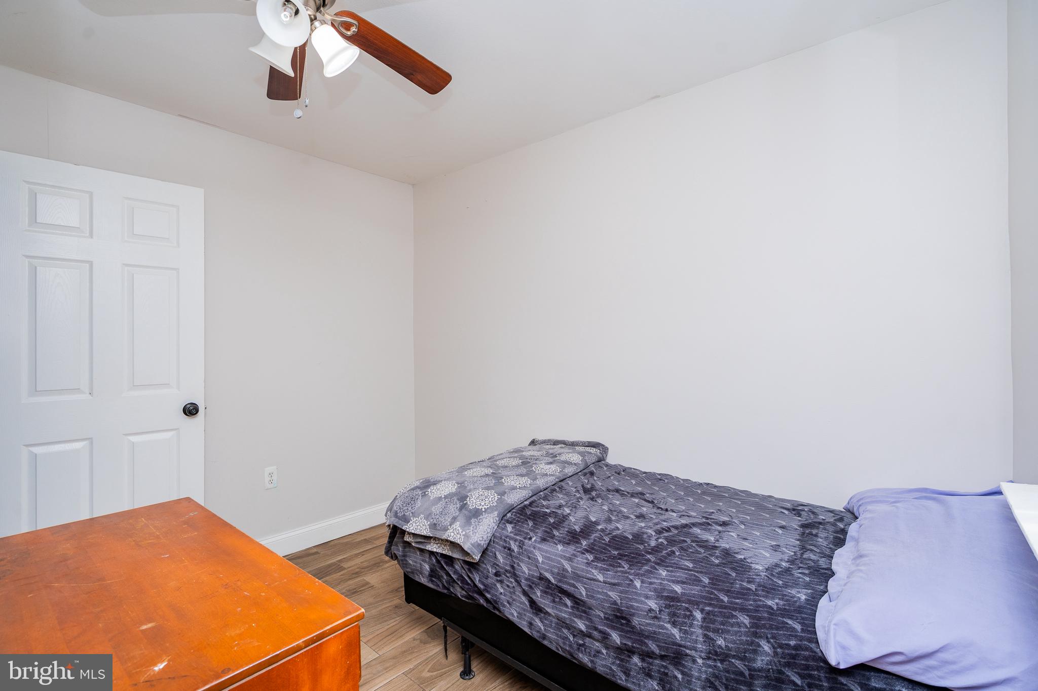 3960 Bel Pre Road, Unit 1 Silver Spring, MD 20906 - Photo 13 of 33 Cozy bedroom with modern charm.