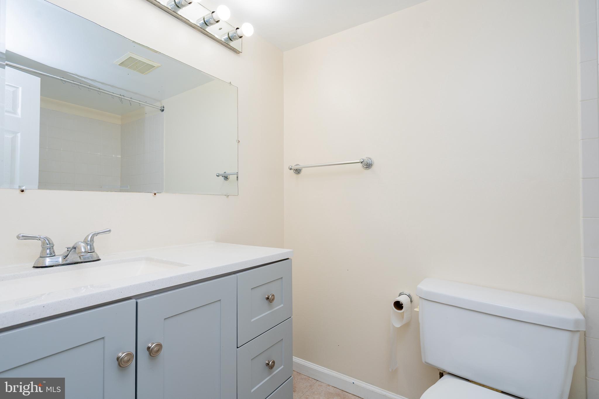 3960 Bel Pre Road, Unit 1 Silver Spring, MD 20906 - Photo 14 of 33 Modern bathroom with sleek finishes.