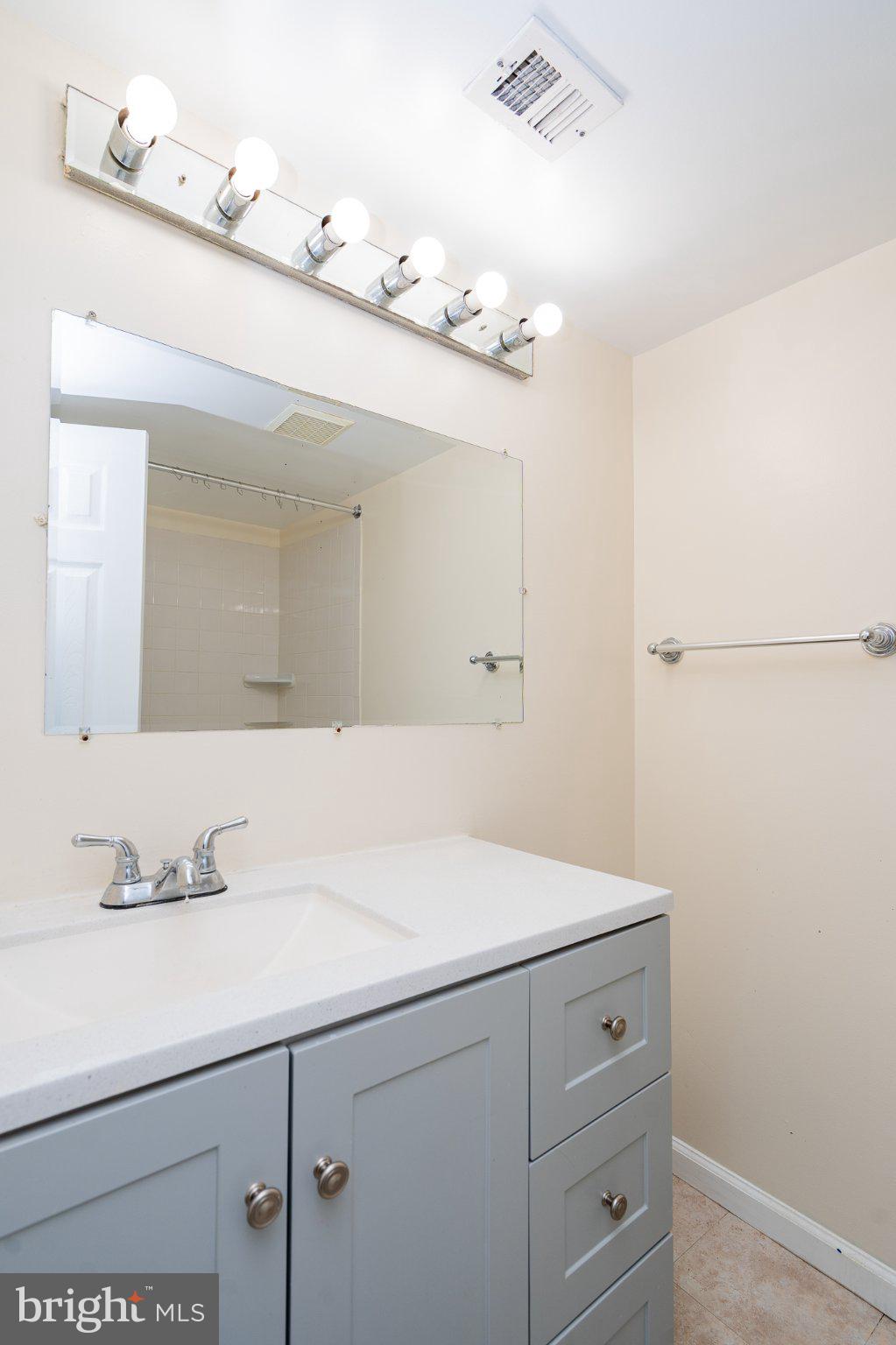 3960 Bel Pre Road, Unit 1 Silver Spring, MD 20906 - Photo 16 of 33 Bright and modern bathroom retreat.